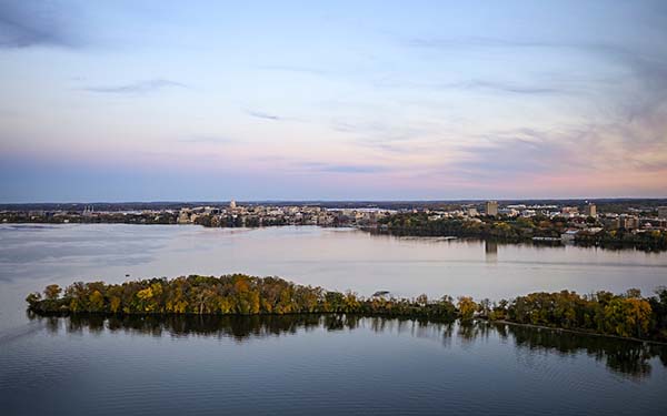 Aerial view of Madison, showing Lake Mendota, Picnic Point, and downtown